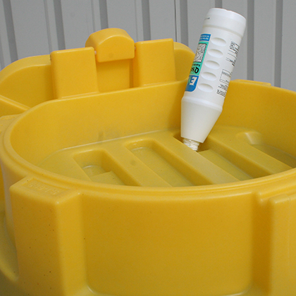 Tromletragten placeres ovenpå tromlen